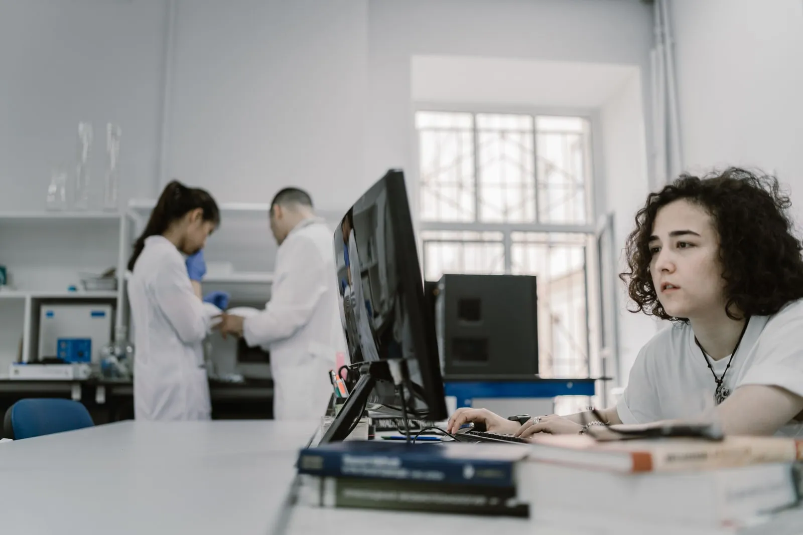 Researchers working at computers in a university laboratory