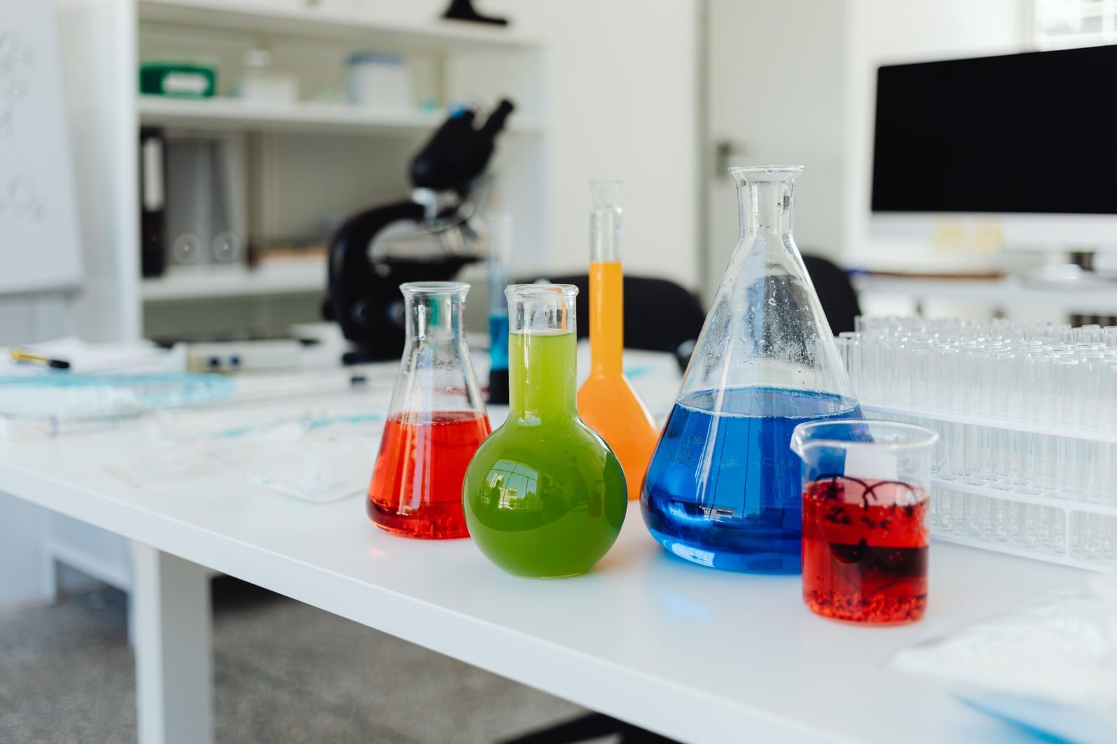 Laboratory glassware arranged on a bench