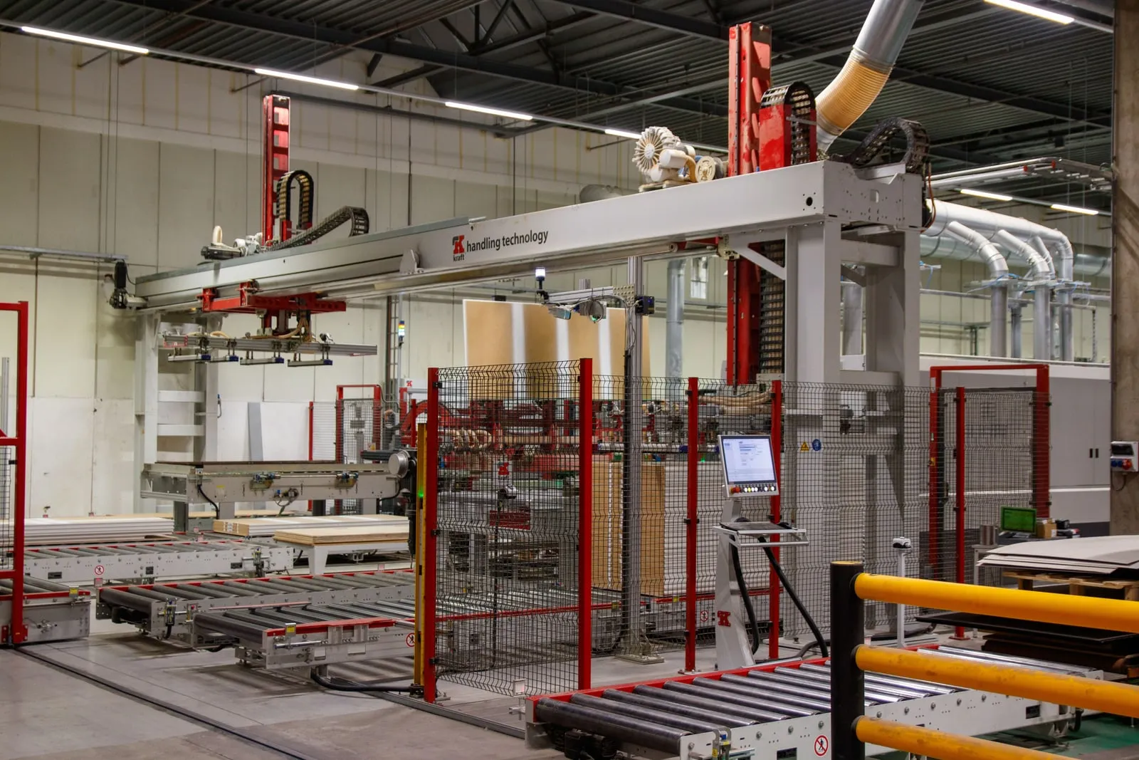 An automated handling line inside a factory hall