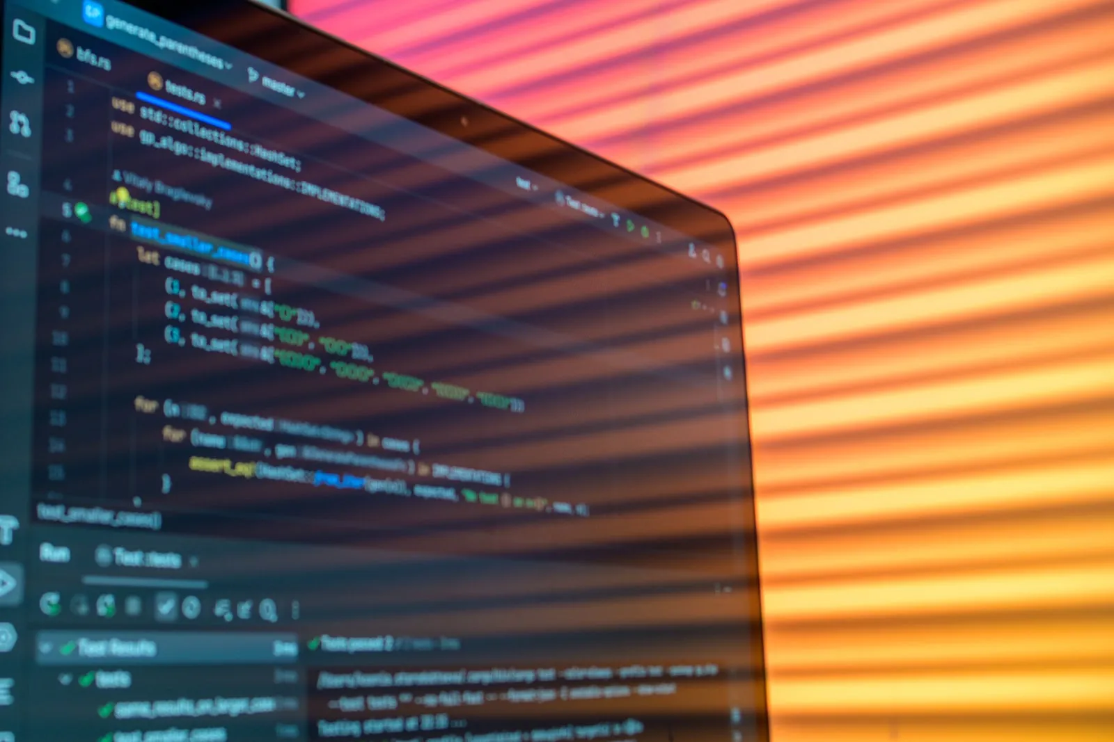 A laptop screen showing lines of program code