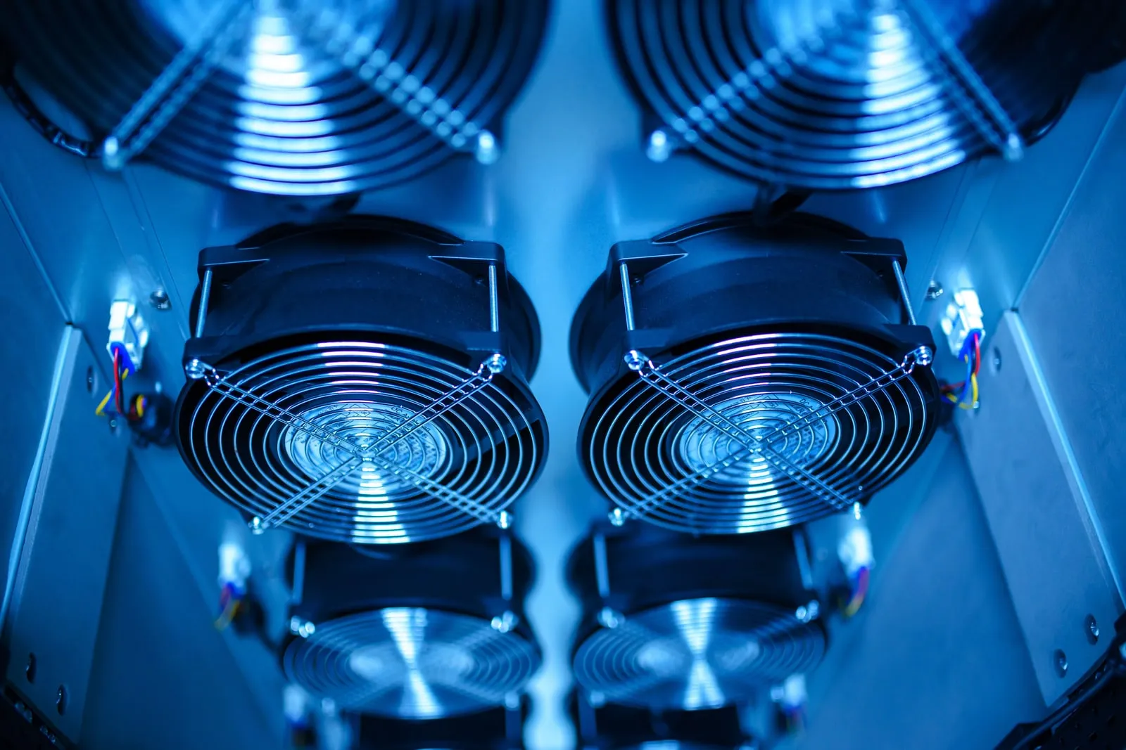 An aisle in a server hall lined with cooling ducts