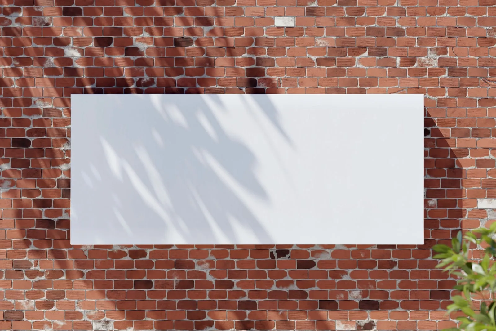 A blank white sign mounted on a wall