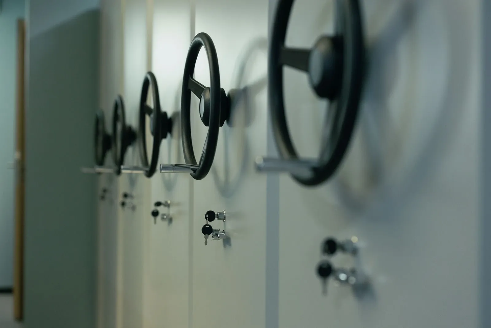 Rows of locking handwheels on a bank of secure storage cabinets