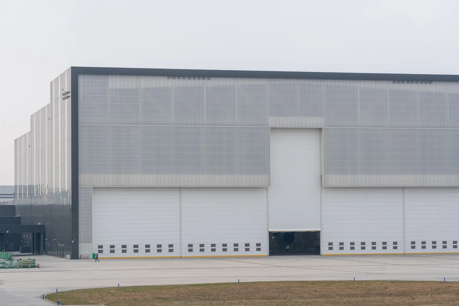 A large windowless industrial building