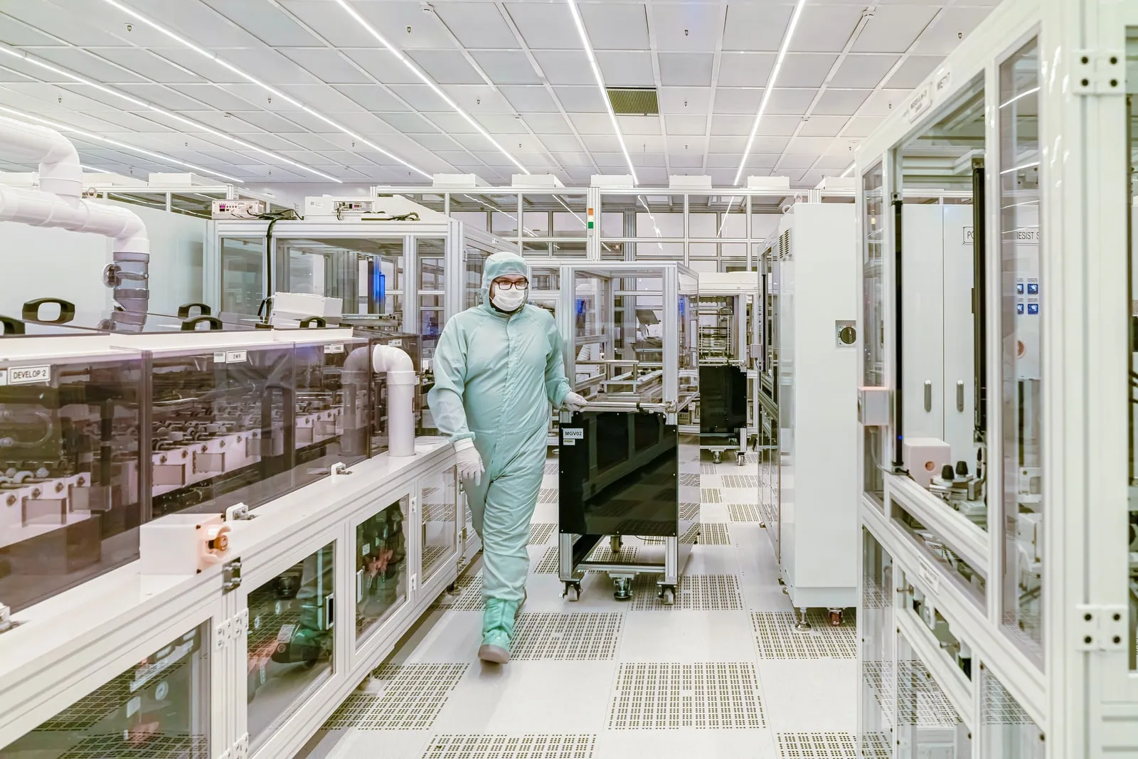 A silicon wafer being handled in a cleanroom