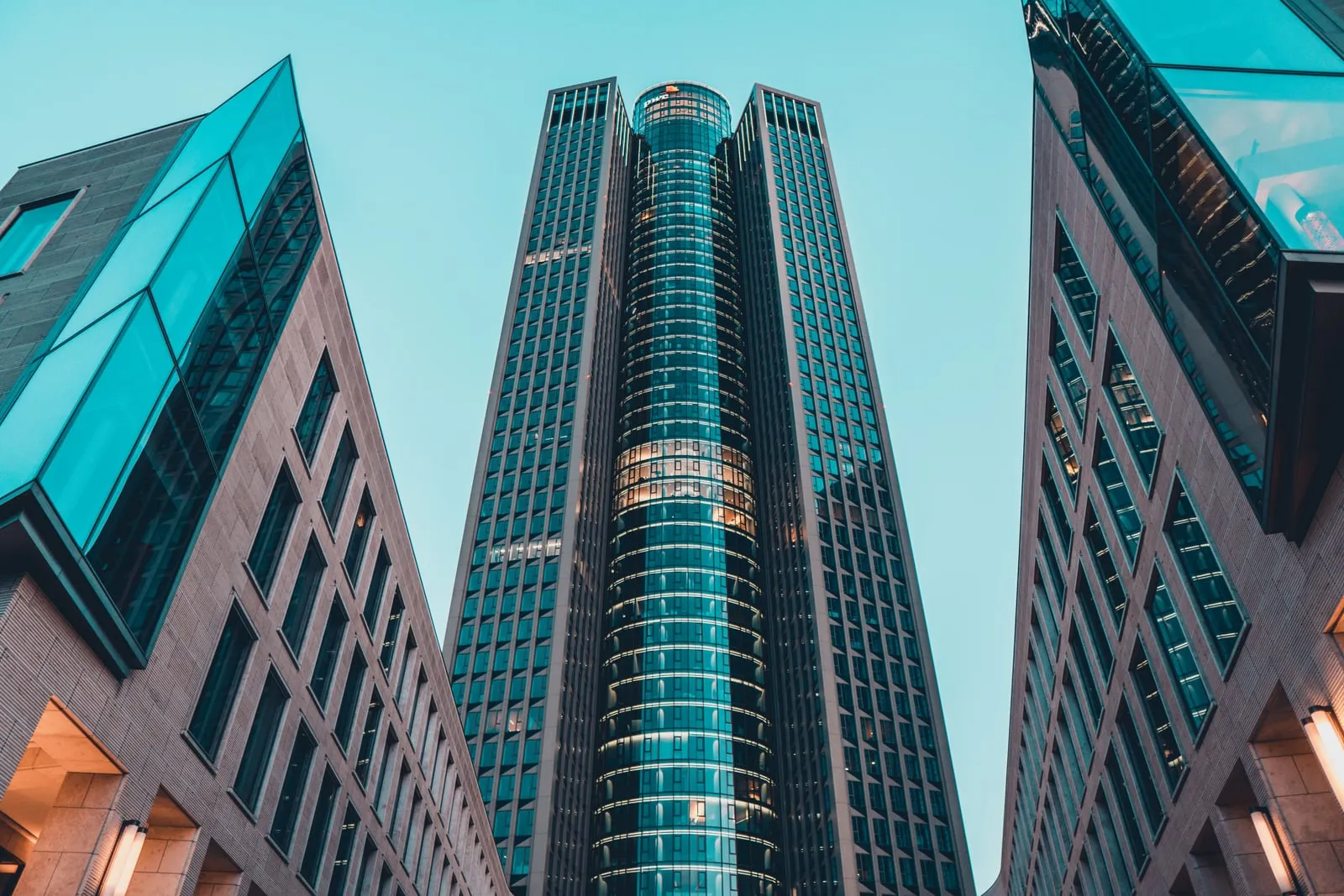 Glass office towers seen looking up from street level