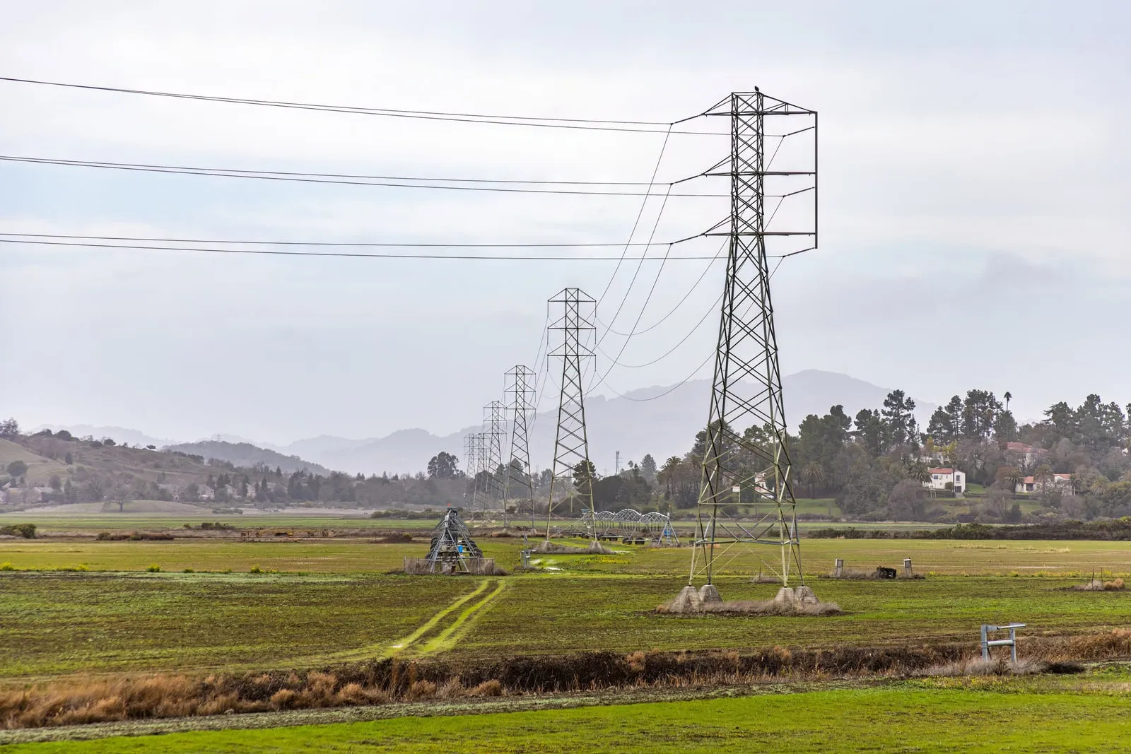 Power transmission lines crossing a field