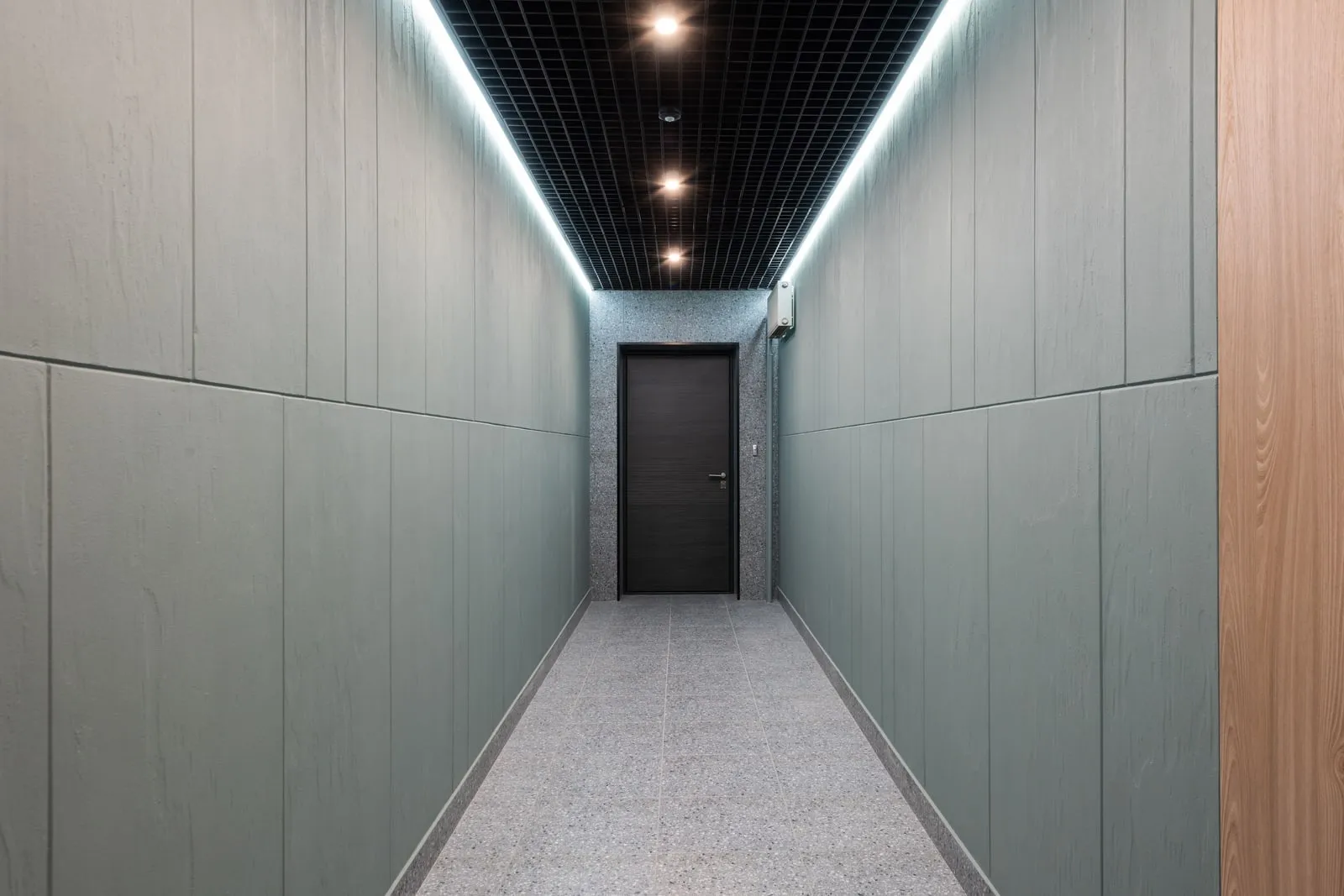 A long empty corridor in an office building