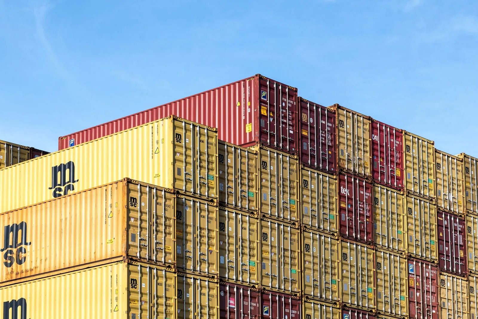 Shipping containers stacked at a port