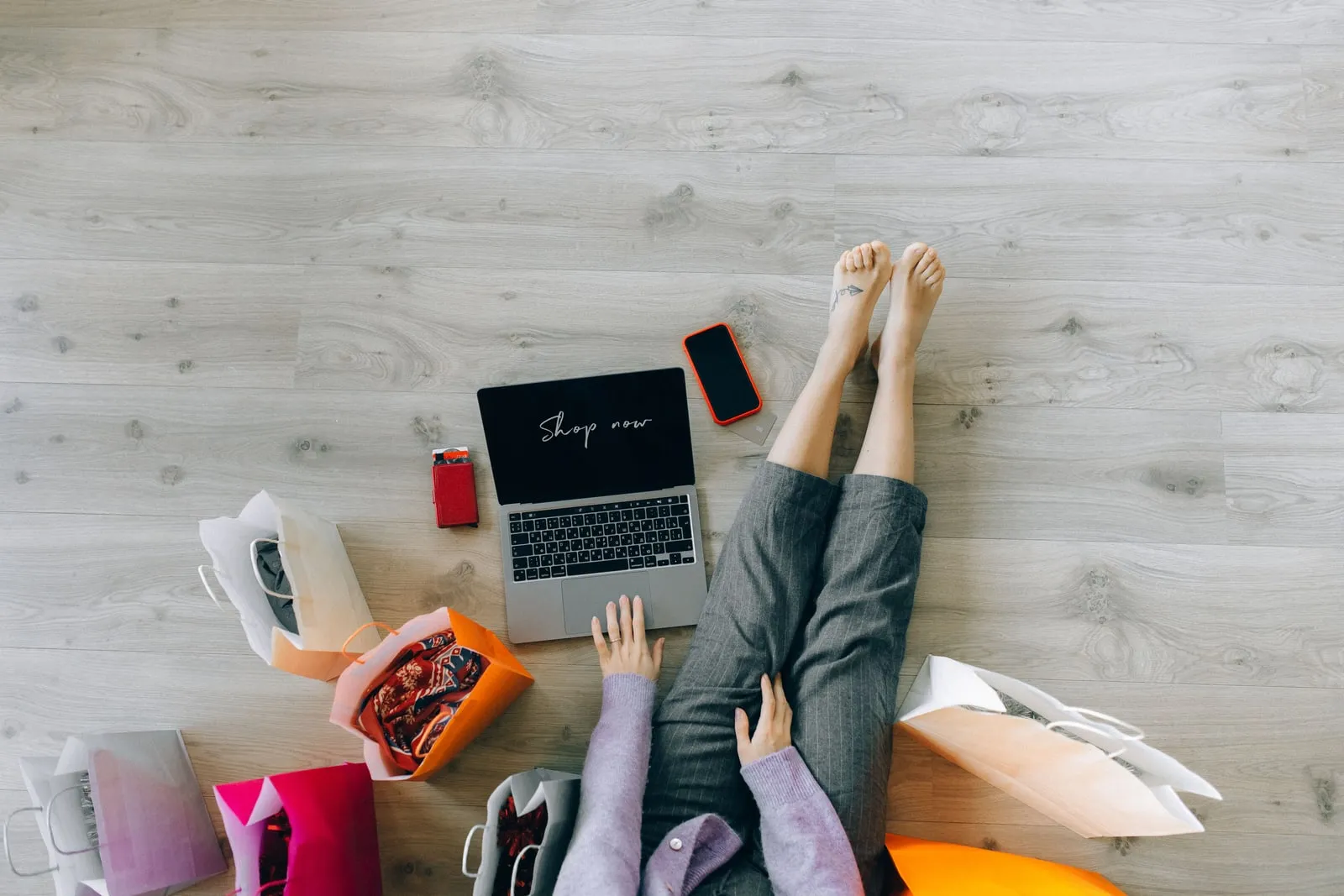 A person shopping online with a laptop