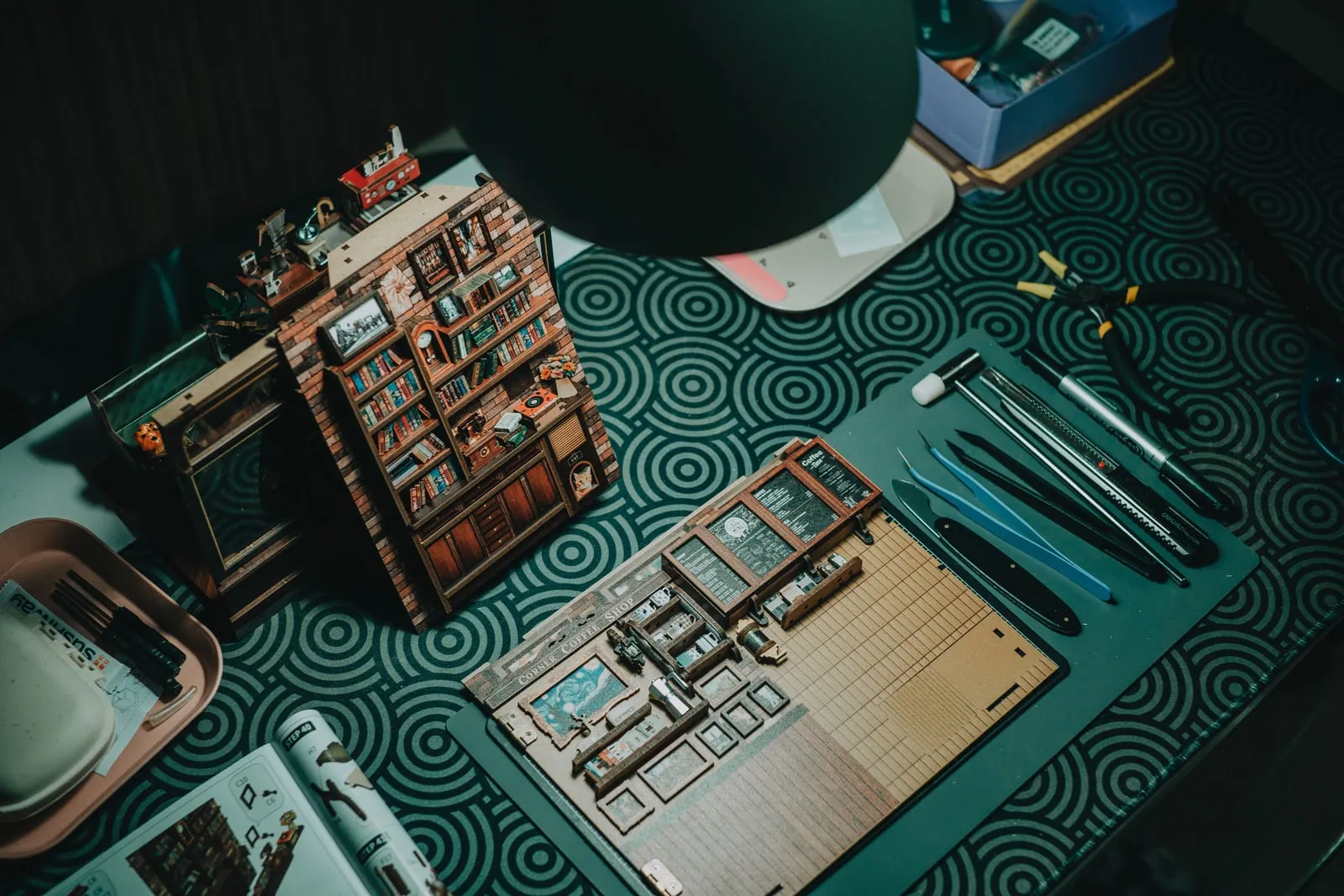A person assembling a bookshelf at home