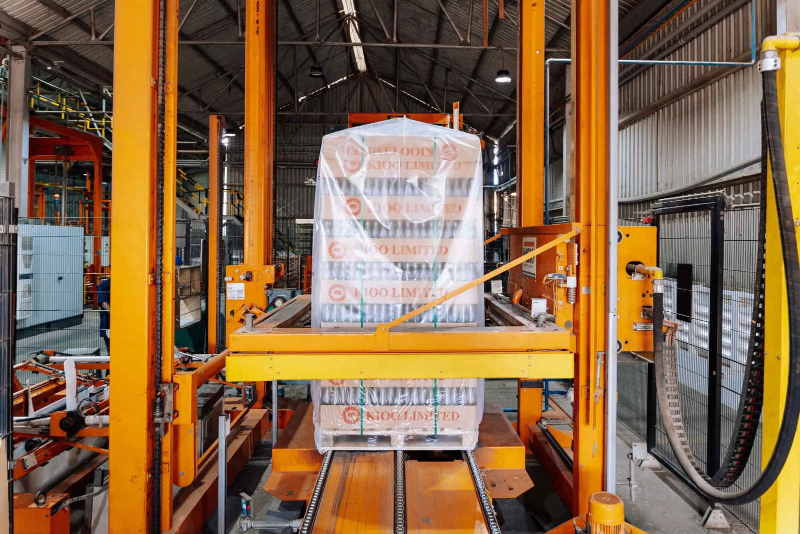 Parcels moving along a conveyor belt in a warehouse