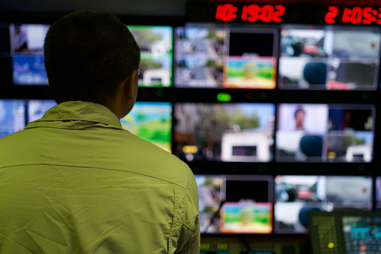 A television studio control room with monitors