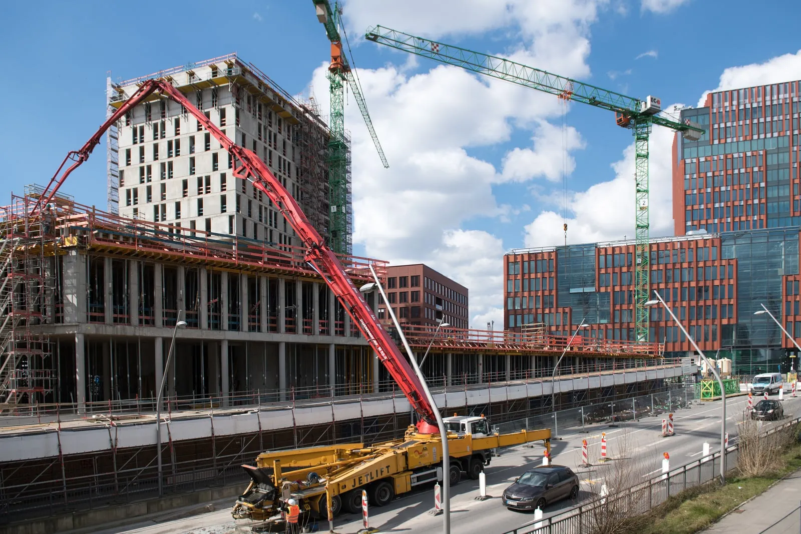 A construction crane over a large building site