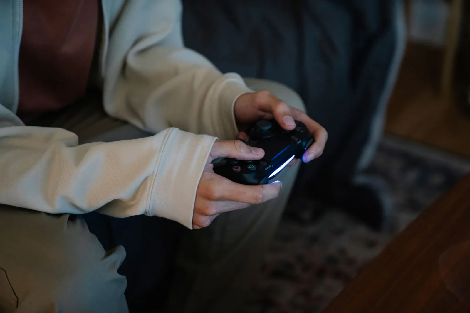 A video game controller held in two hands