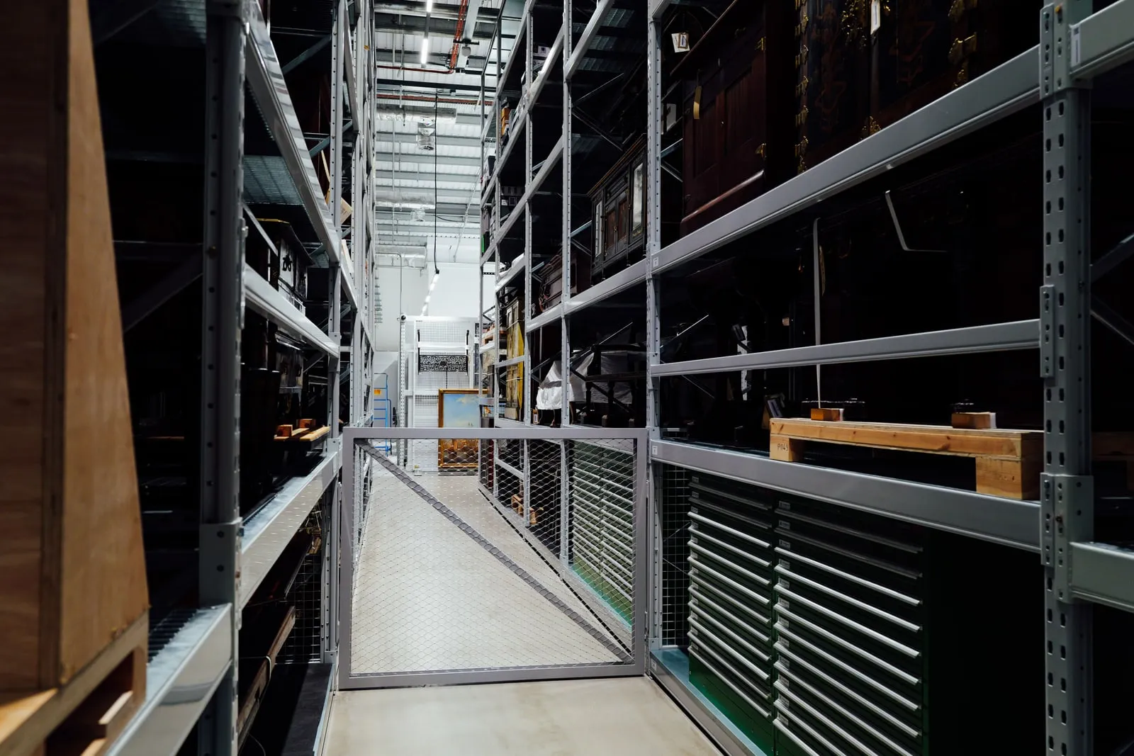 Rows of equipment racks along a corridor
