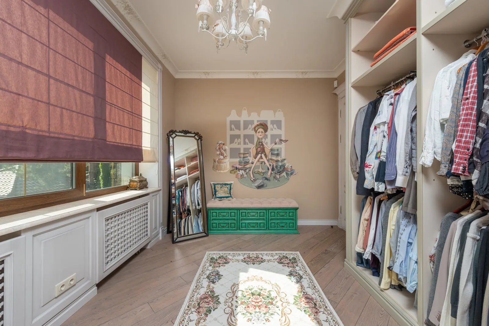 A full-length mirror standing in a walk-in wardrobe
