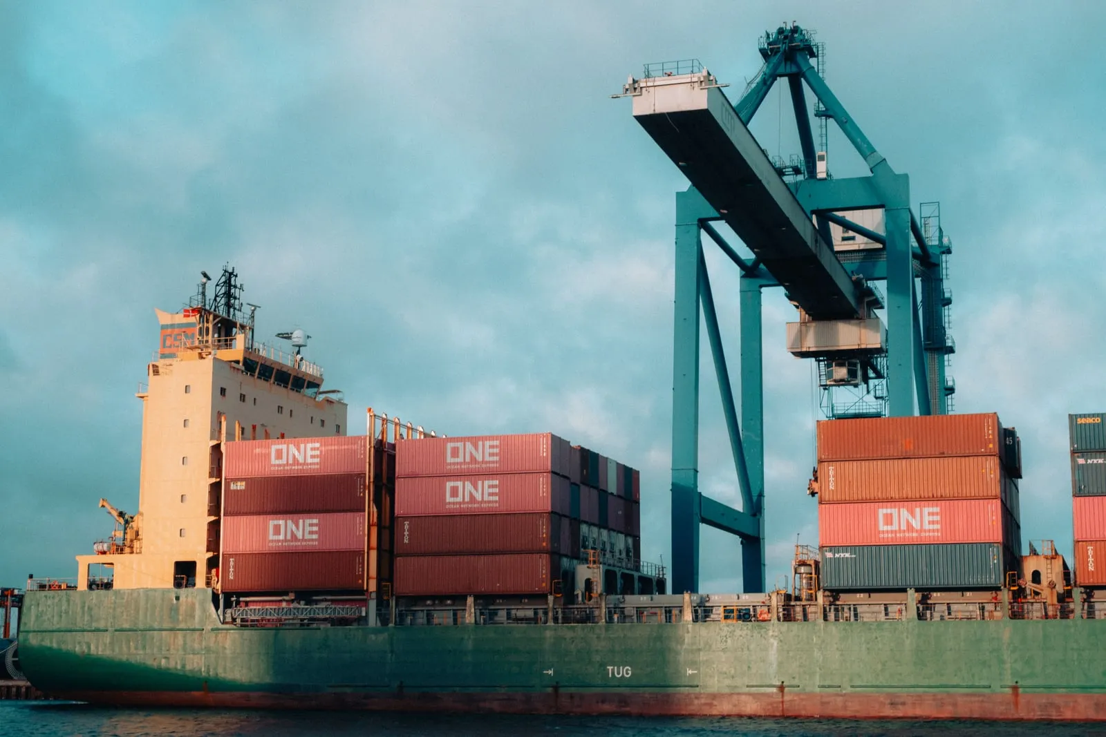 A cargo ship loaded with containers at sea