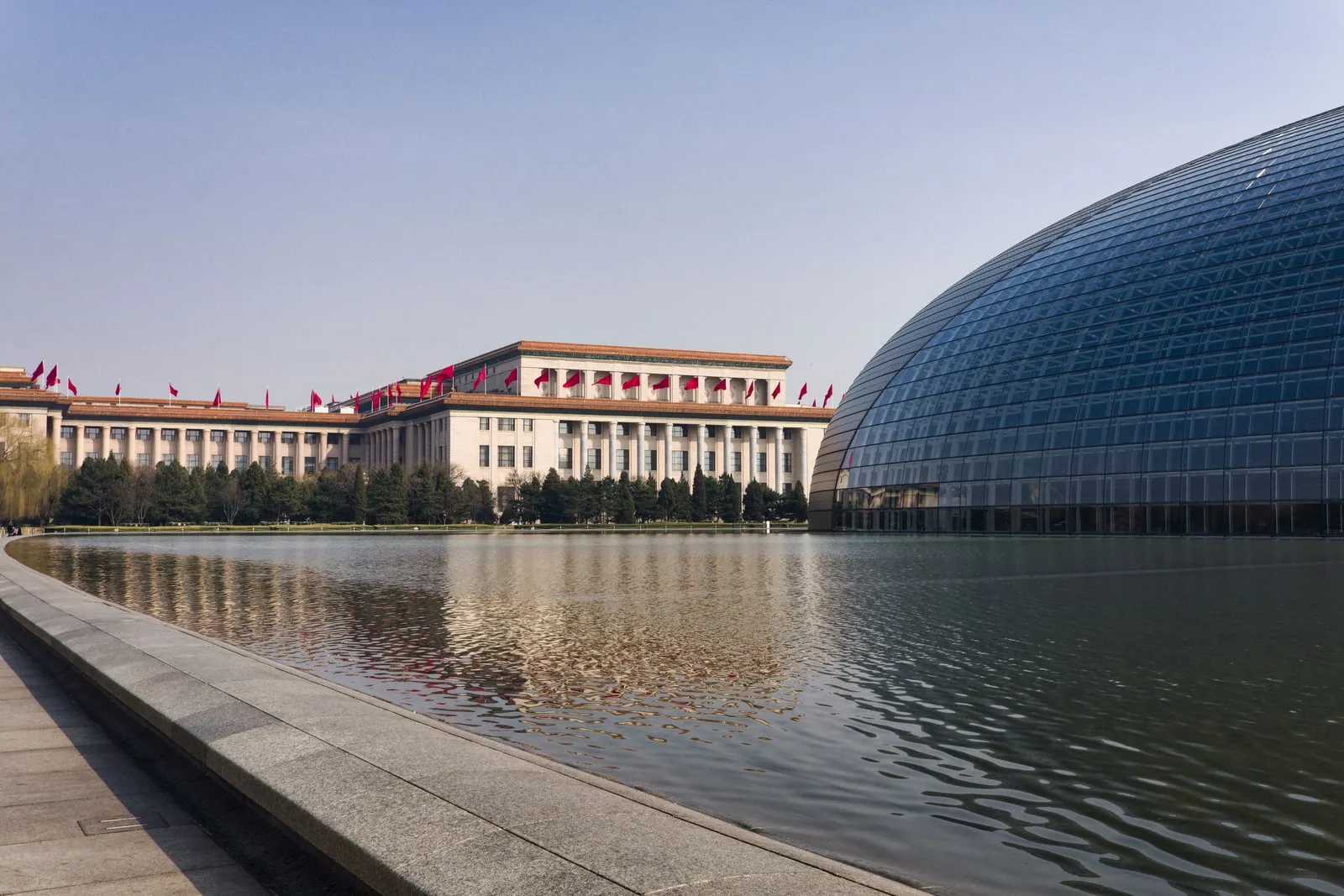 Great Hall of the People in Beijing beside a reflecting pool