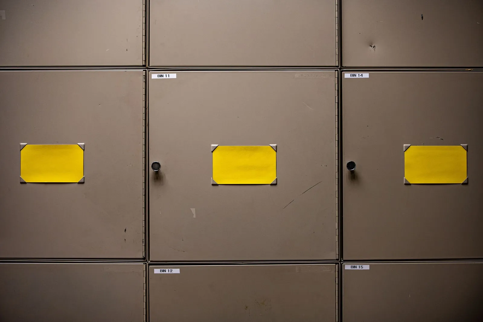 Rows of metal filing cabinets in an office