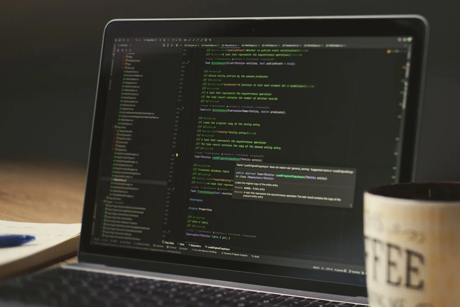 Close-up of a laptop screen showing a code editor