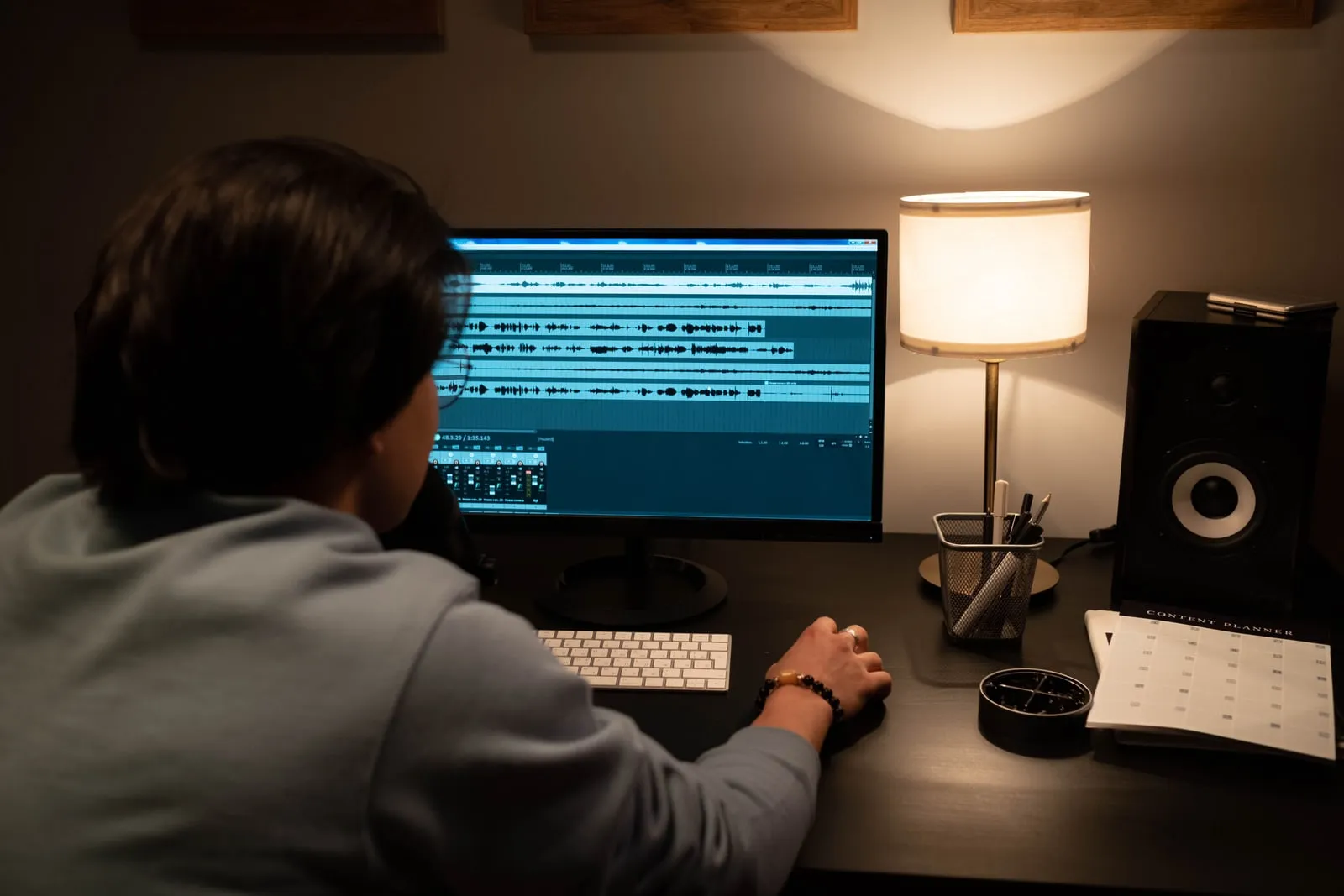 An audio waveform displayed on a computer screen in a studio