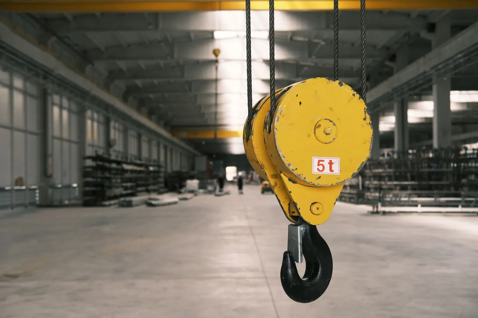A crane lifting equipment at an industrial site