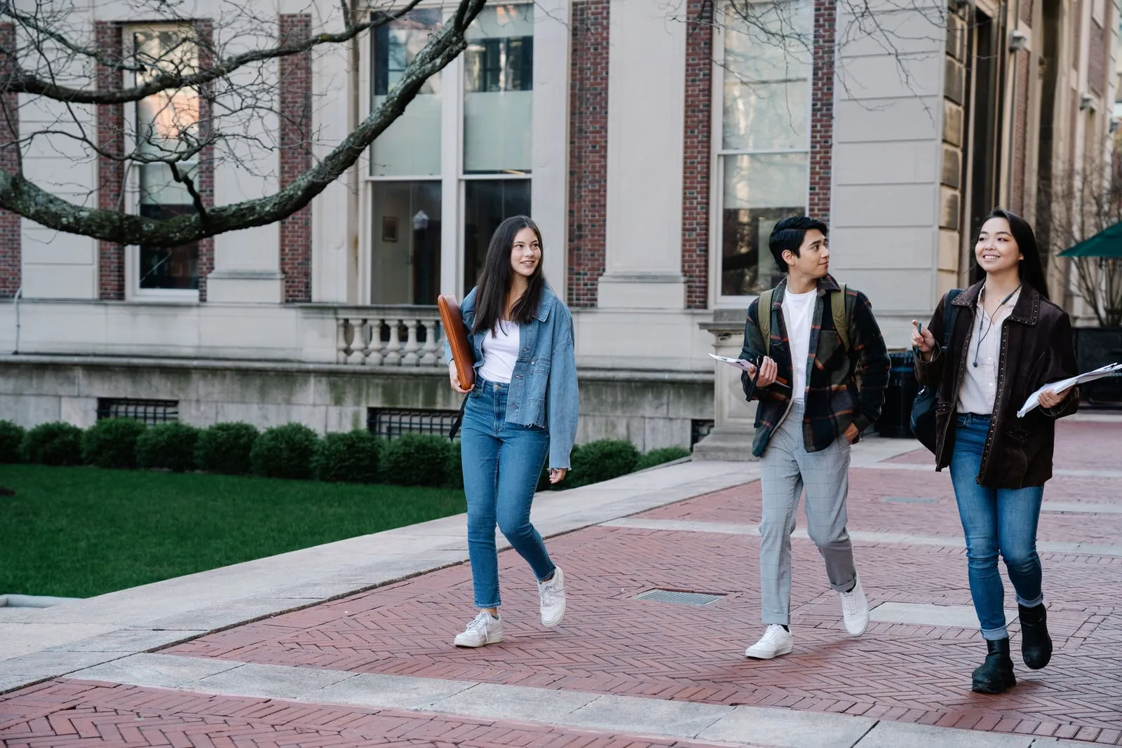 Students walking on a university campus path
