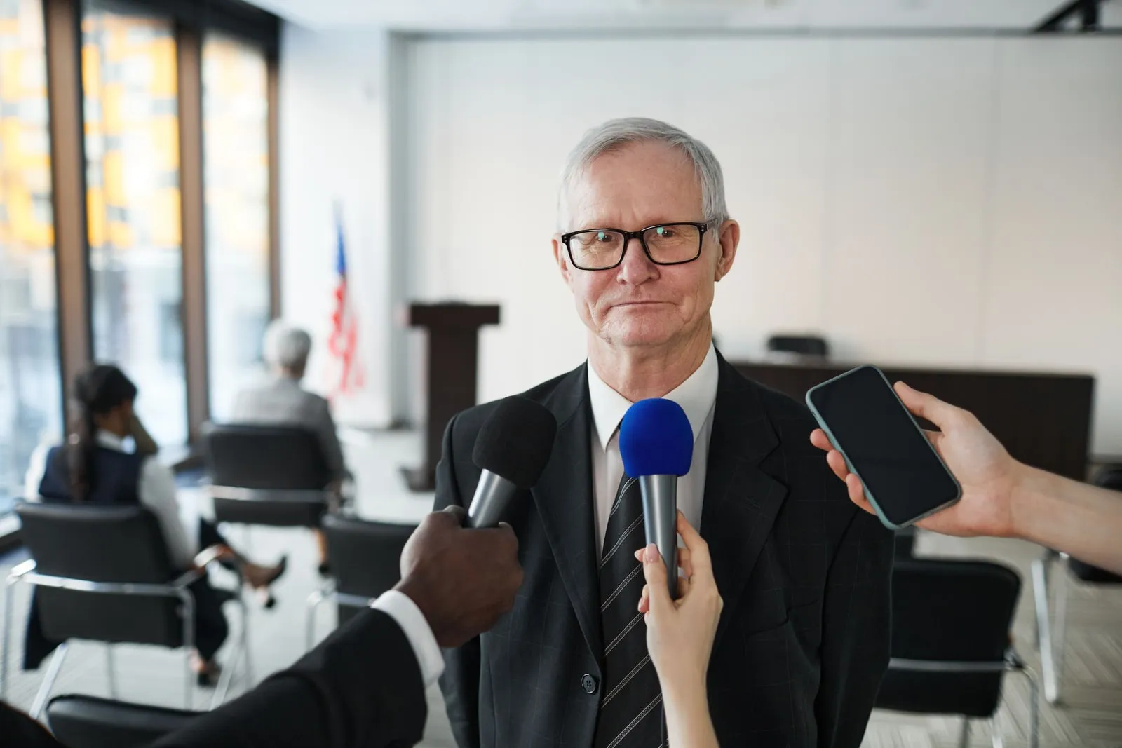 A microphone on a podium at a press conference