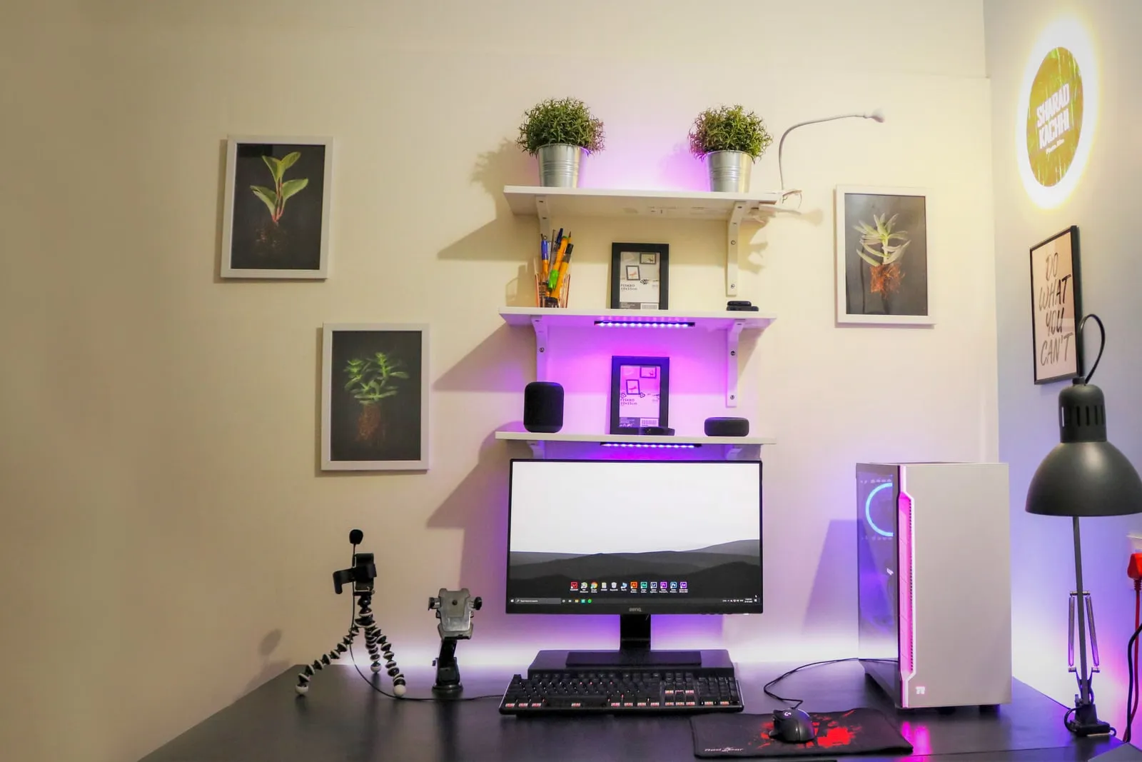 A computer monitor on a desk in a home office