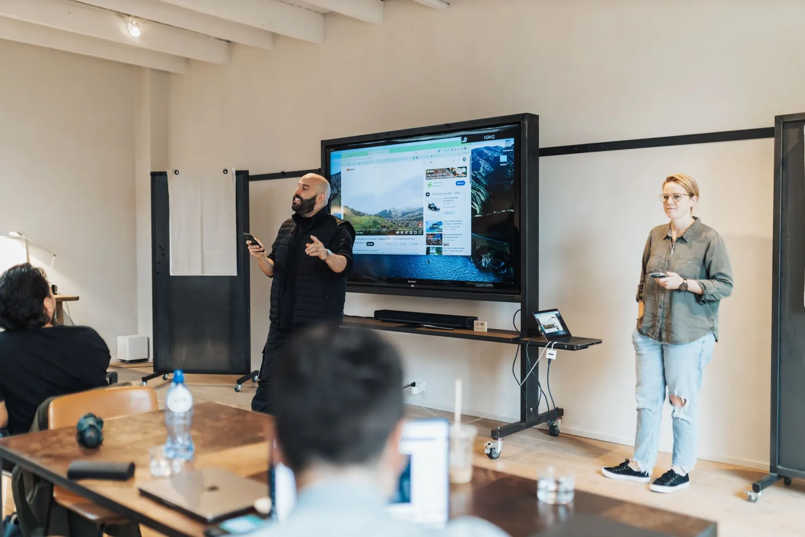 A presentation on a large screen in a meeting room
