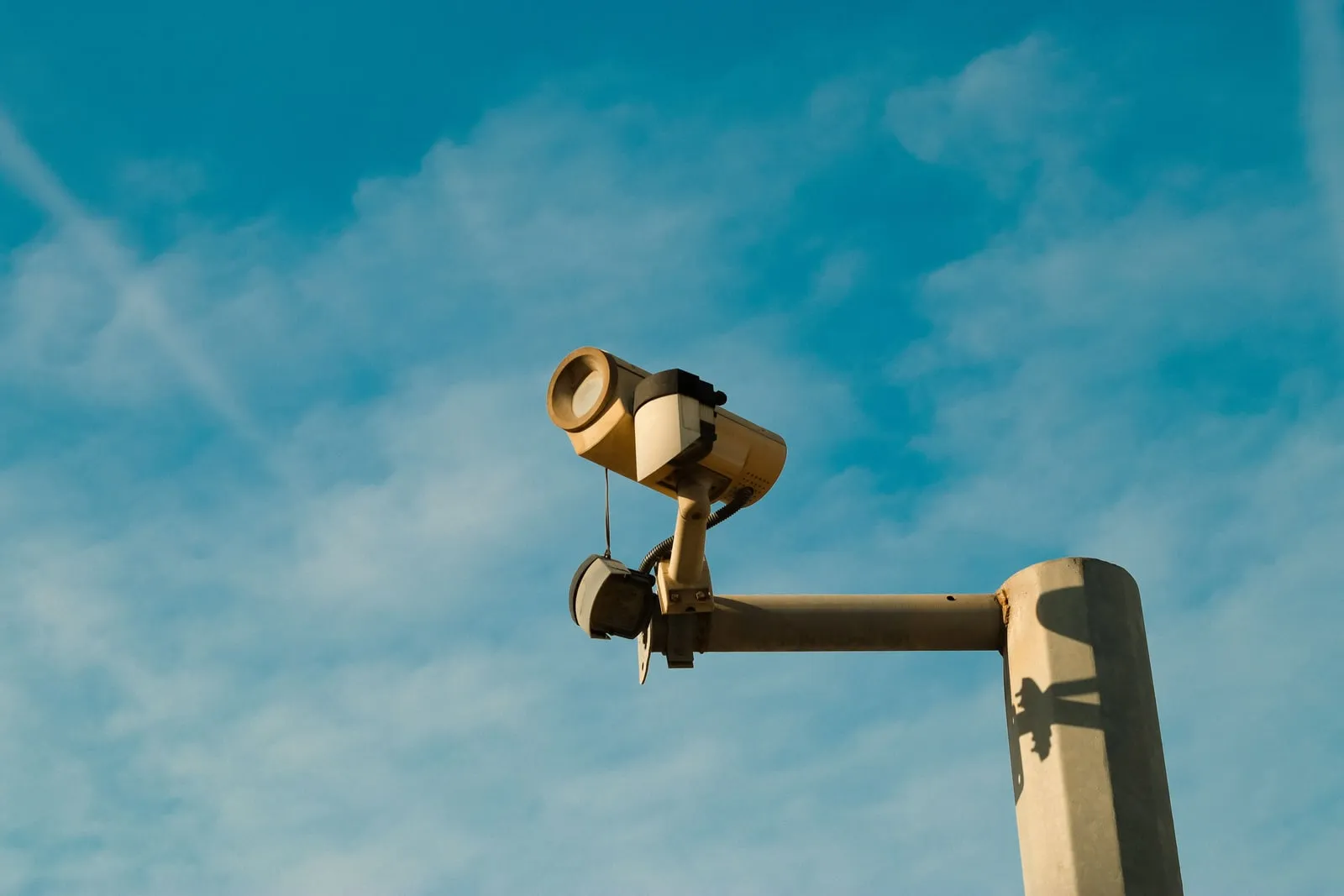 A security camera mounted on a wall