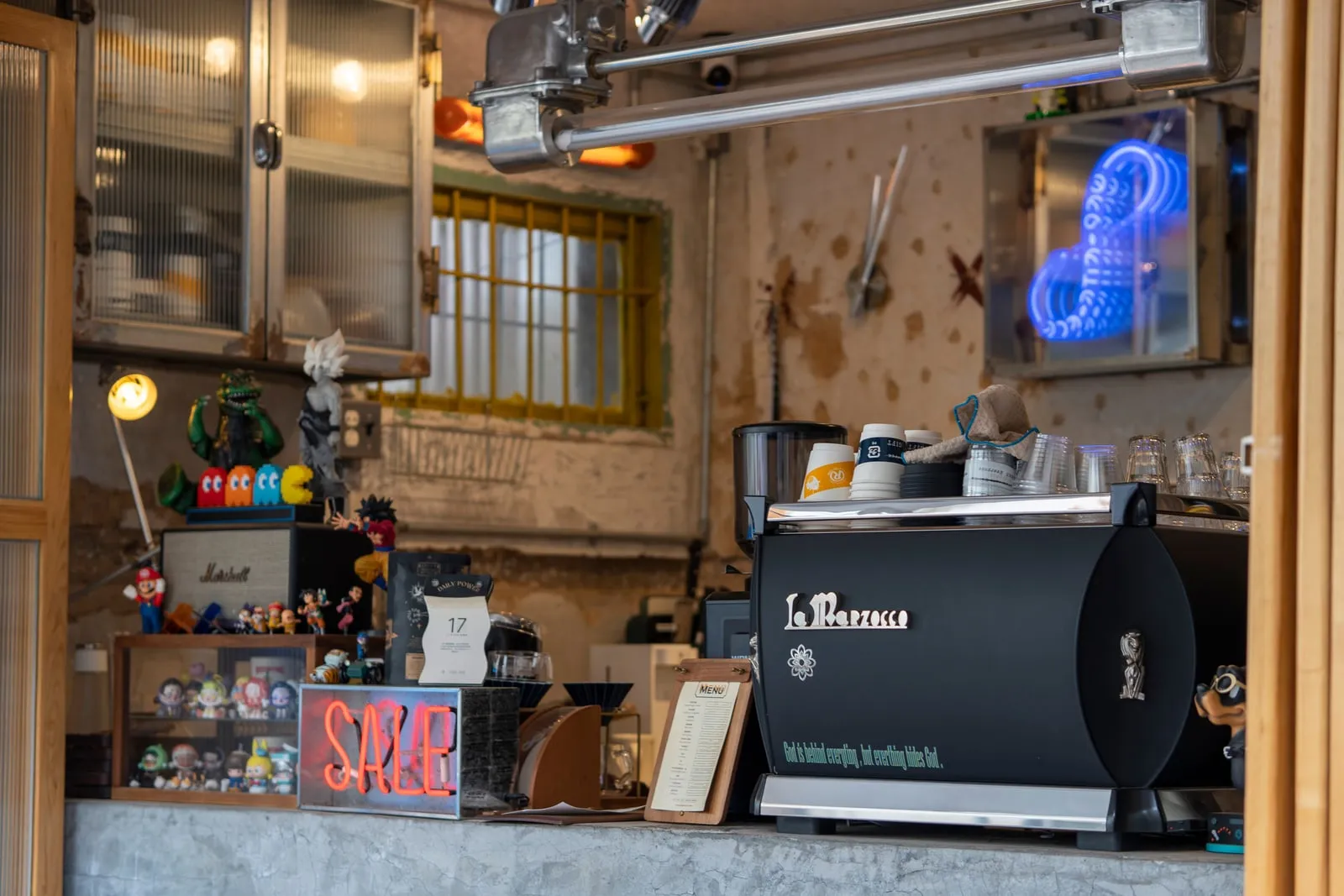 A cafe counter with an espresso machine