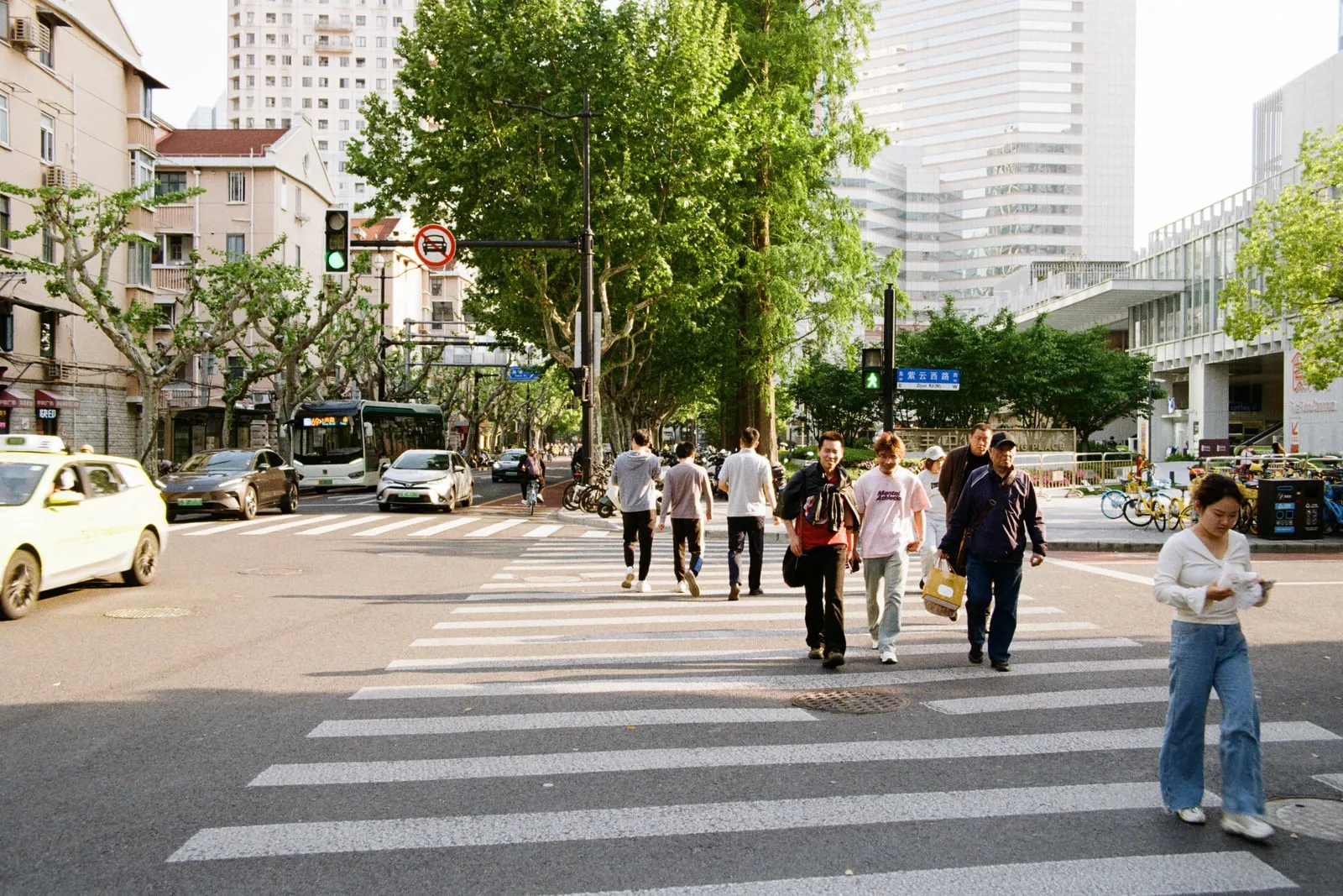 Commuters walking through a city street in the morning
