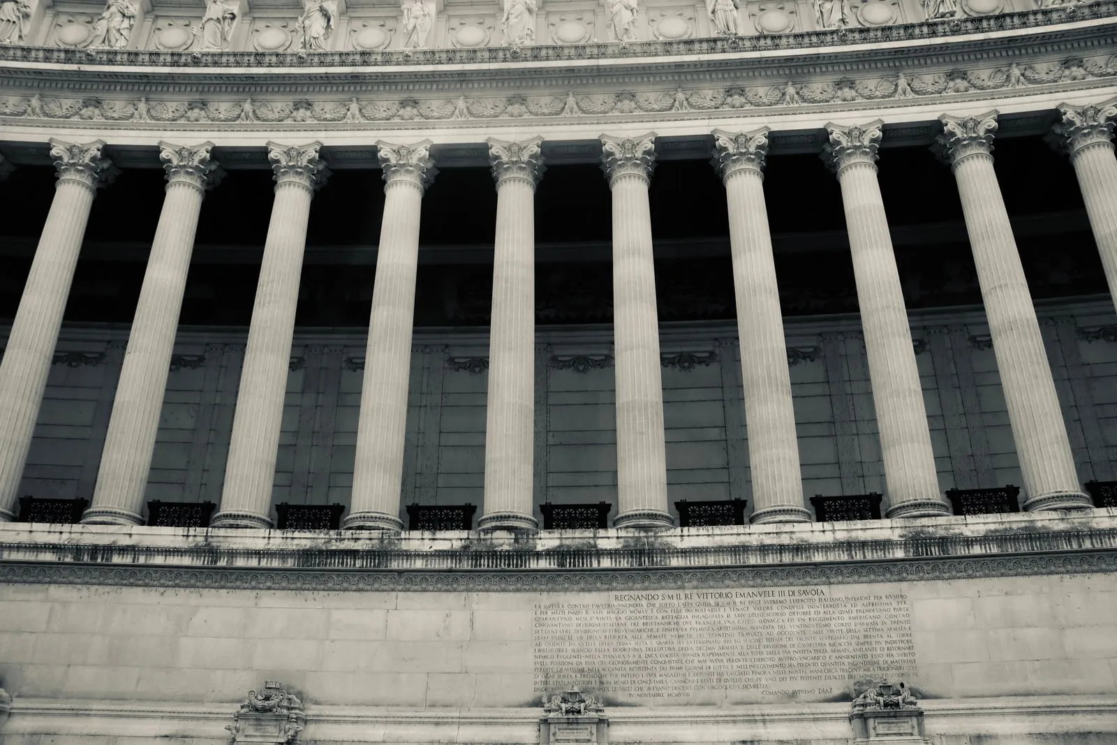 A colonnade of stone columns on a neoclassical building