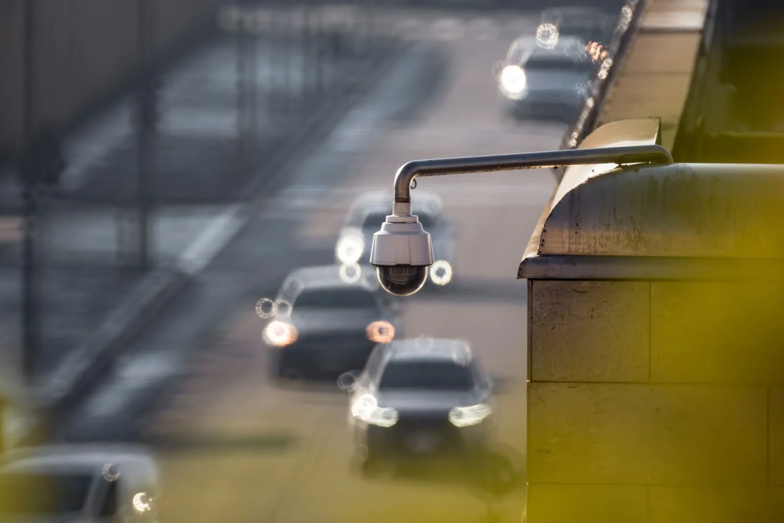 CCTV camera mounted above a busy road
