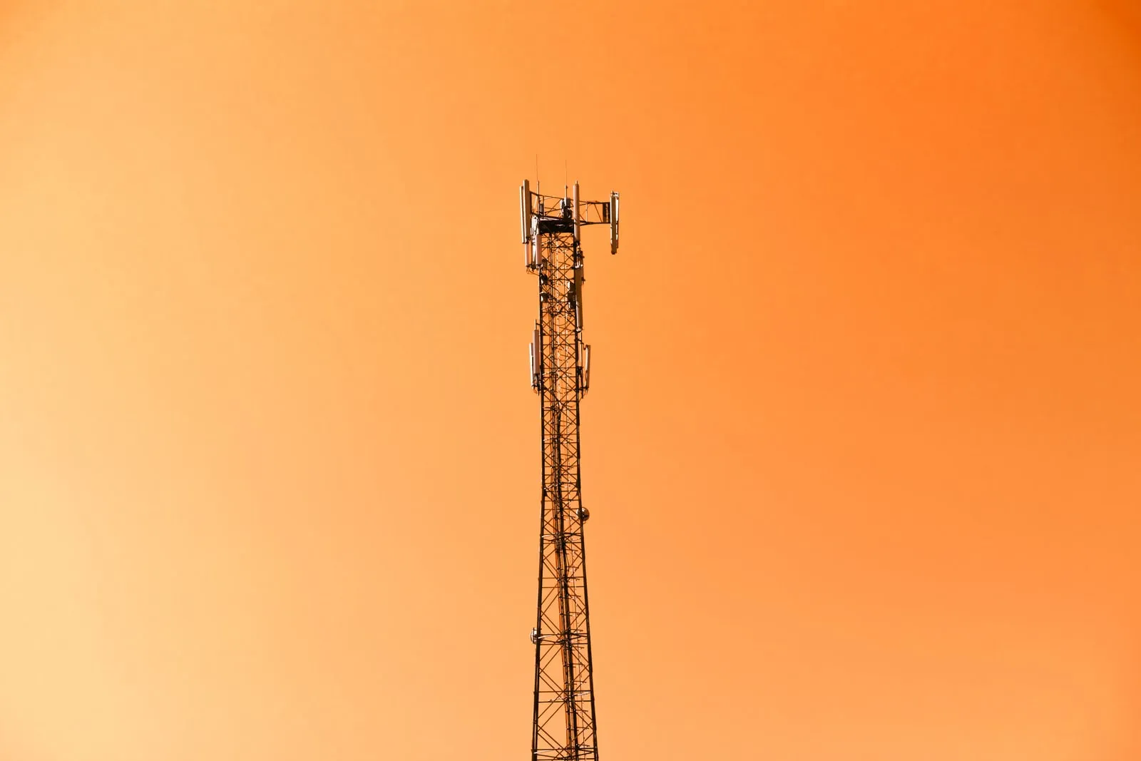 A telecommunications mast against the sky