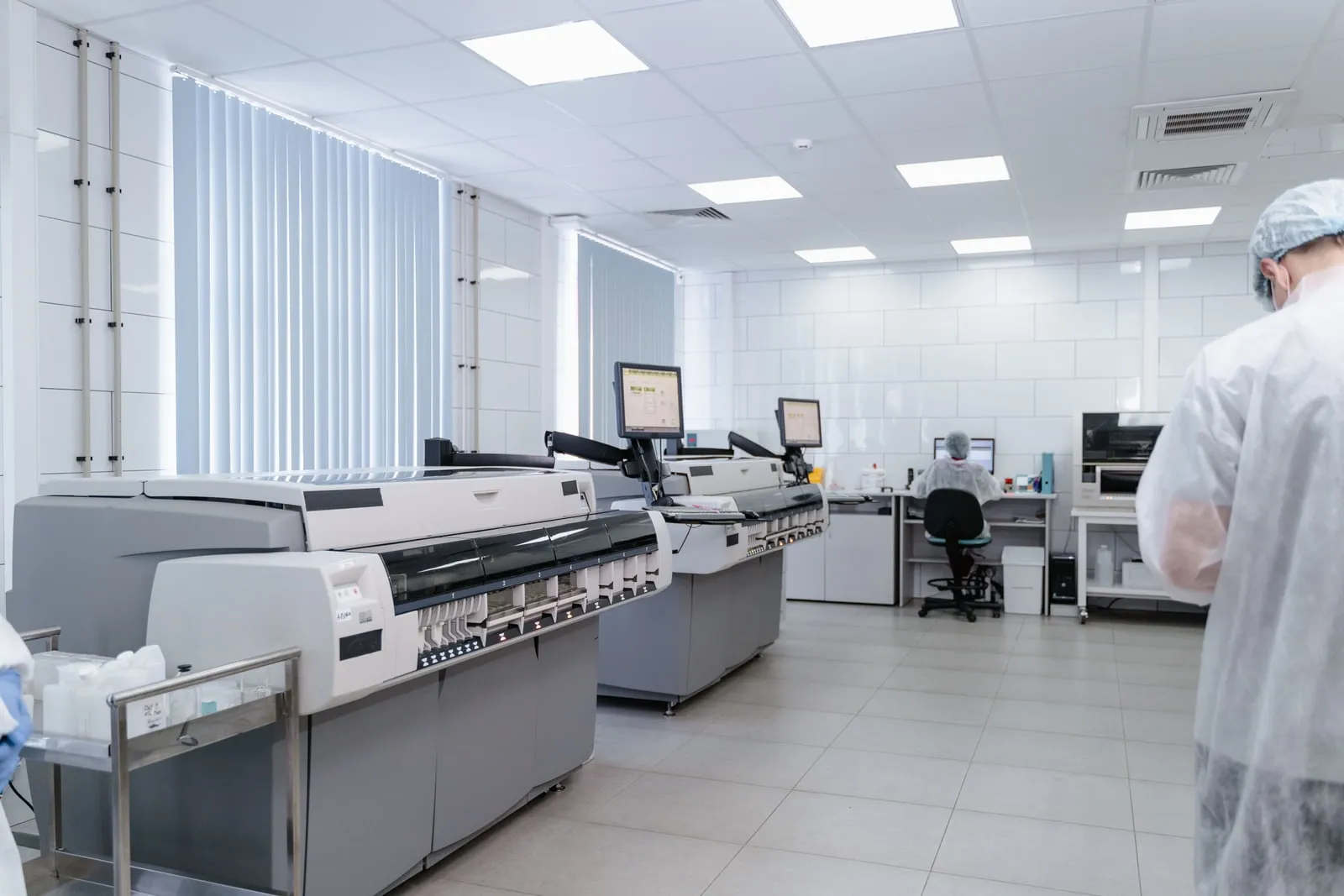 A modern research laboratory with benches and analytical instruments