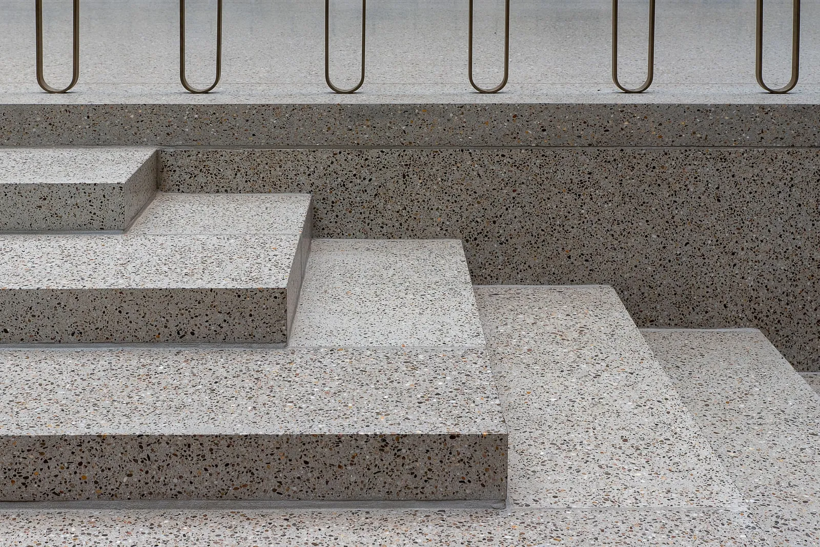 A concrete staircase with wide steps
