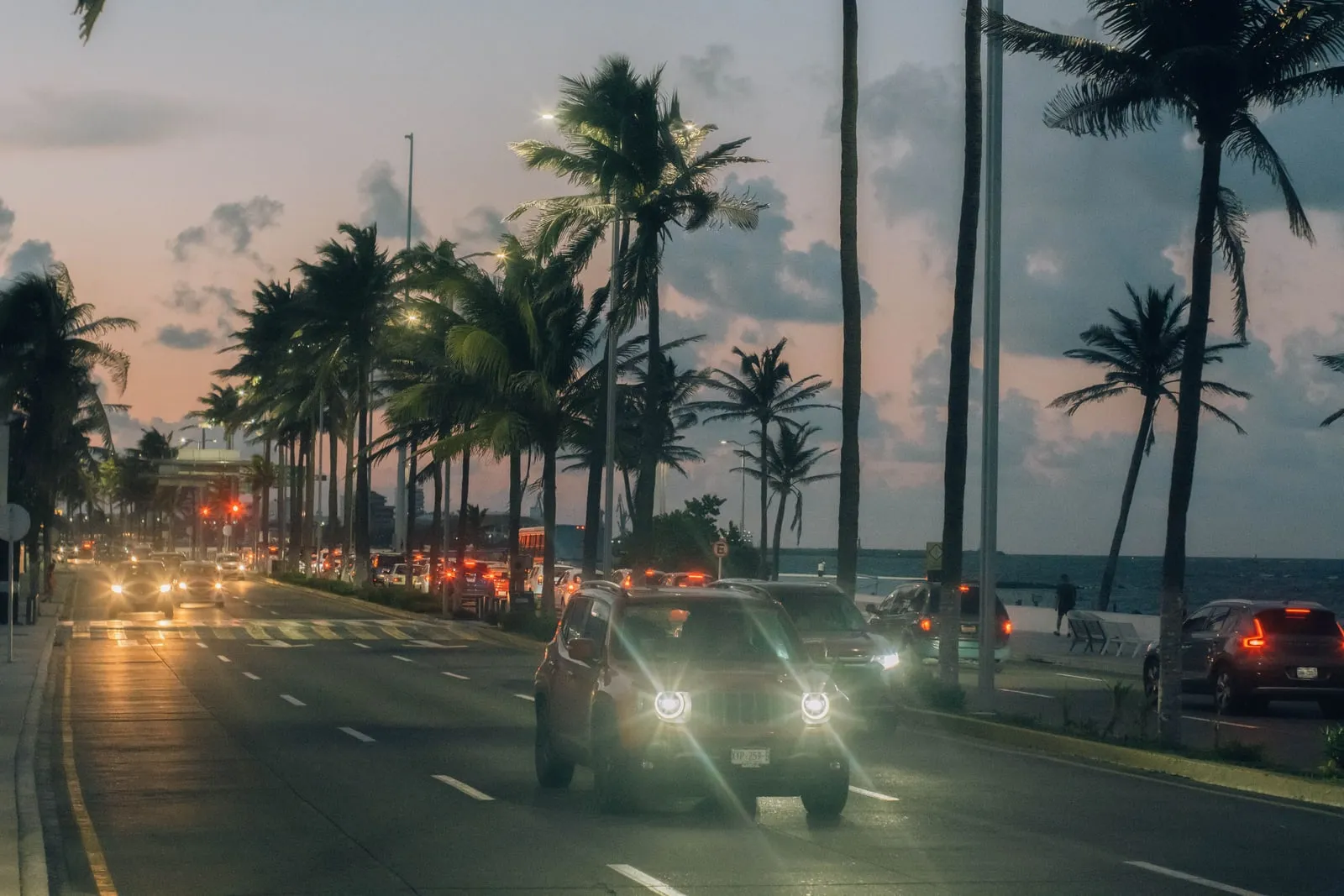 Cars driving on a motorway at dusk