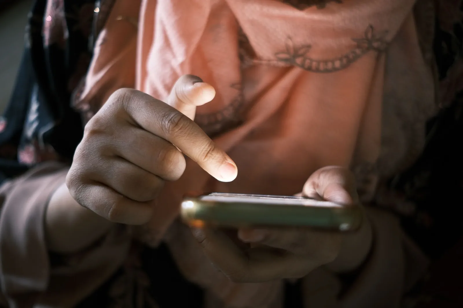 Hands holding a smartphone