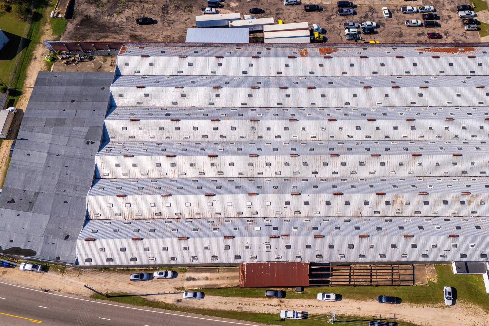 An aerial view of a large warehouse building