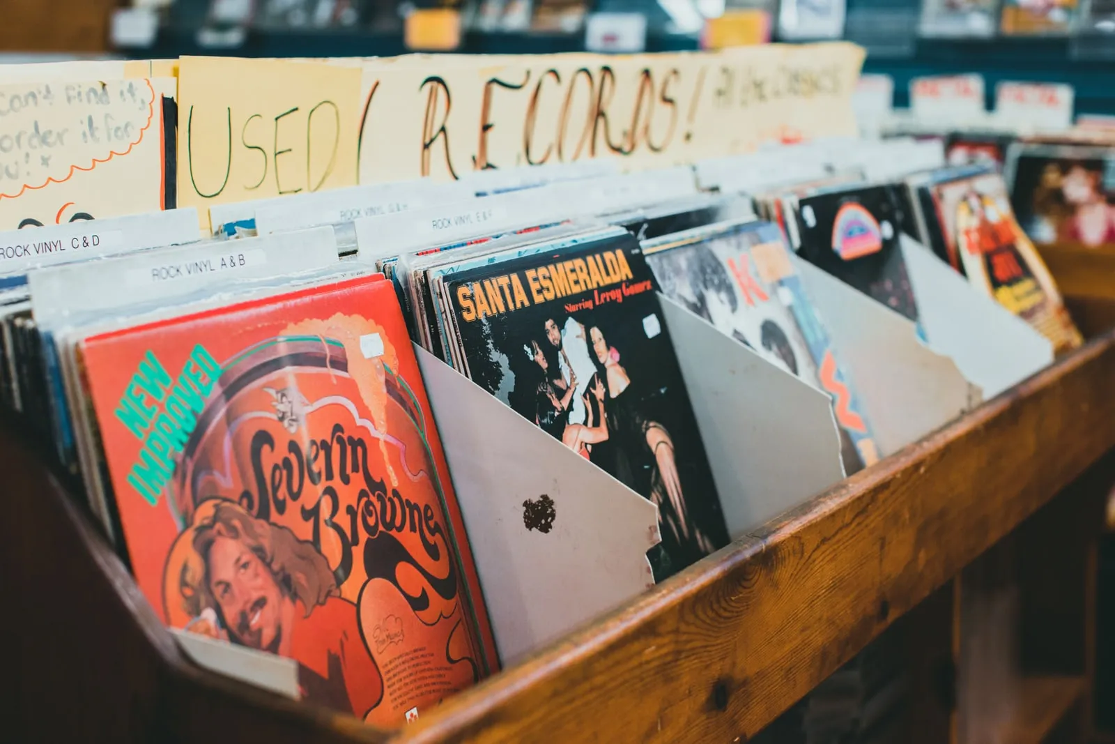 Vinyl records lined up on a shelf