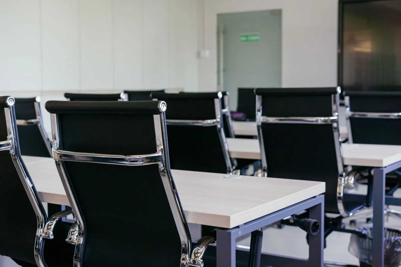 An empty desk with an office chair