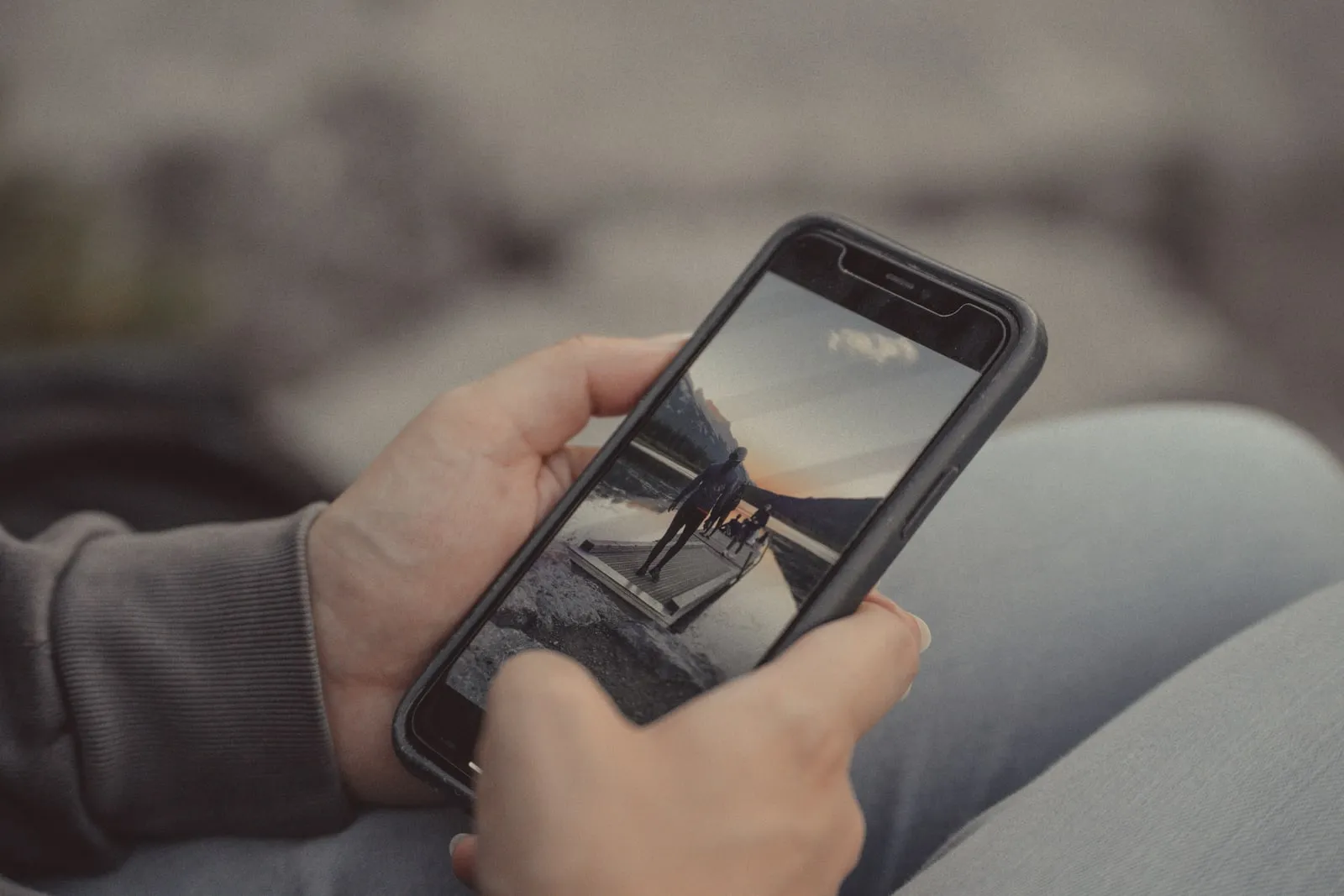 Hands holding a smartphone