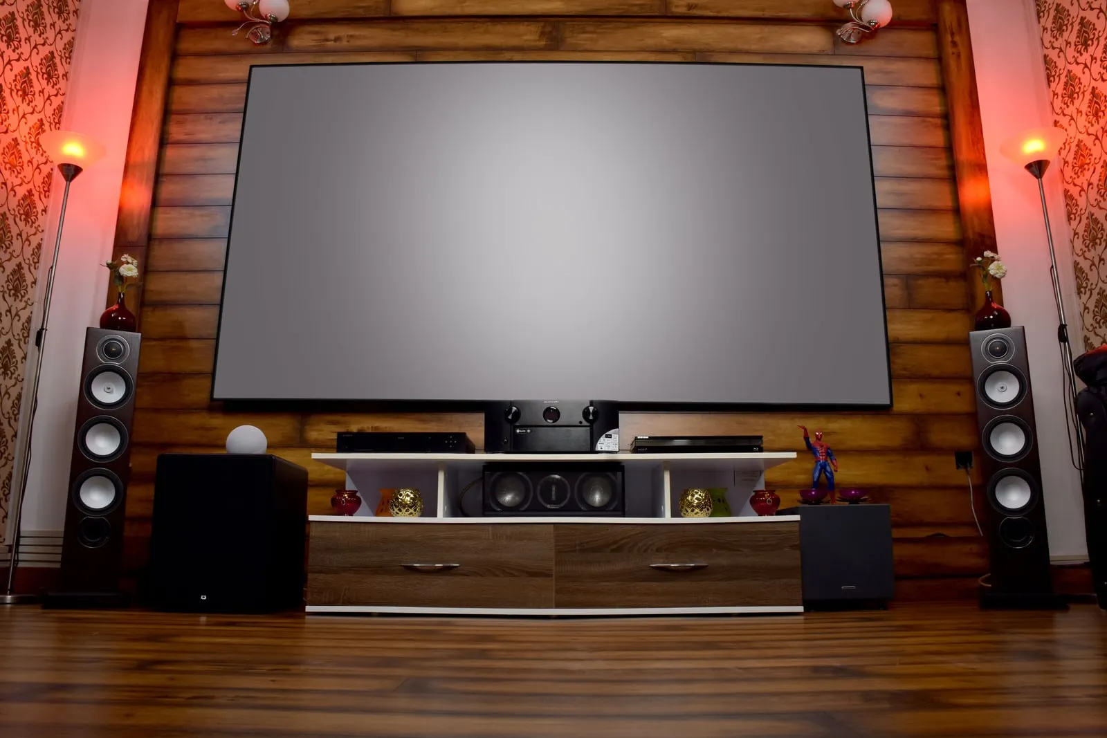 A home entertainment system with speakers in a living room